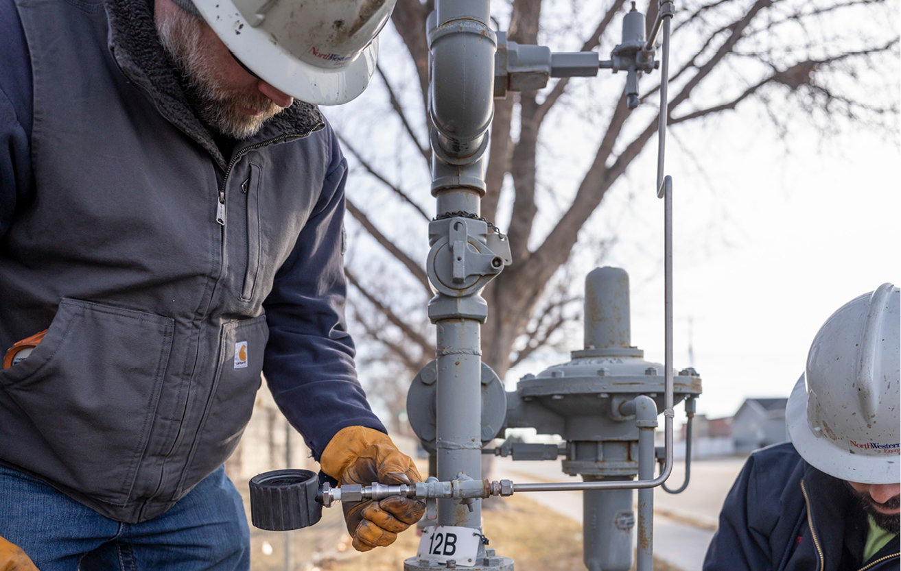 Natural gas worker works in the field